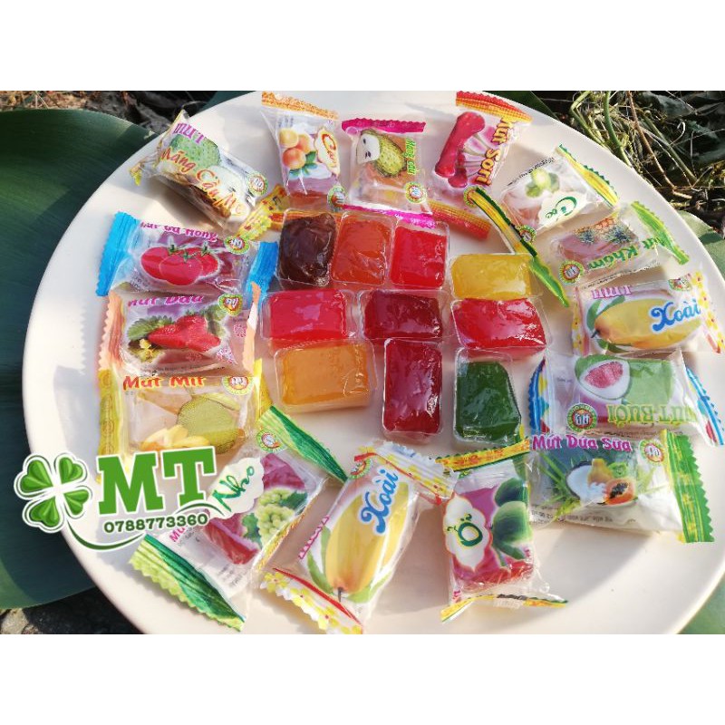 Mứt trái cây thập cẩm 14 loại 1kg ( xoài, mít, sơri, bưởi, khóm,cam, nho, dâu, mãng cầu, mãng cầu me, ổi, cốc, dứa sữa)