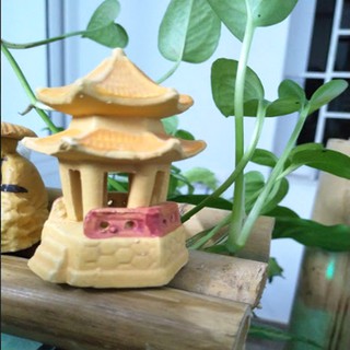 Tượng ông ngư+Tháp vàng