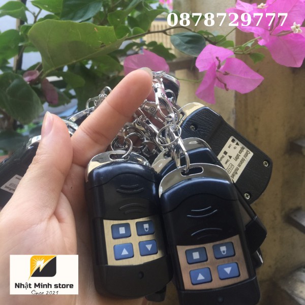Điều khiển cửa cuốn hàng chính hãng mã gạt 433 MHZ  pin siêu bền