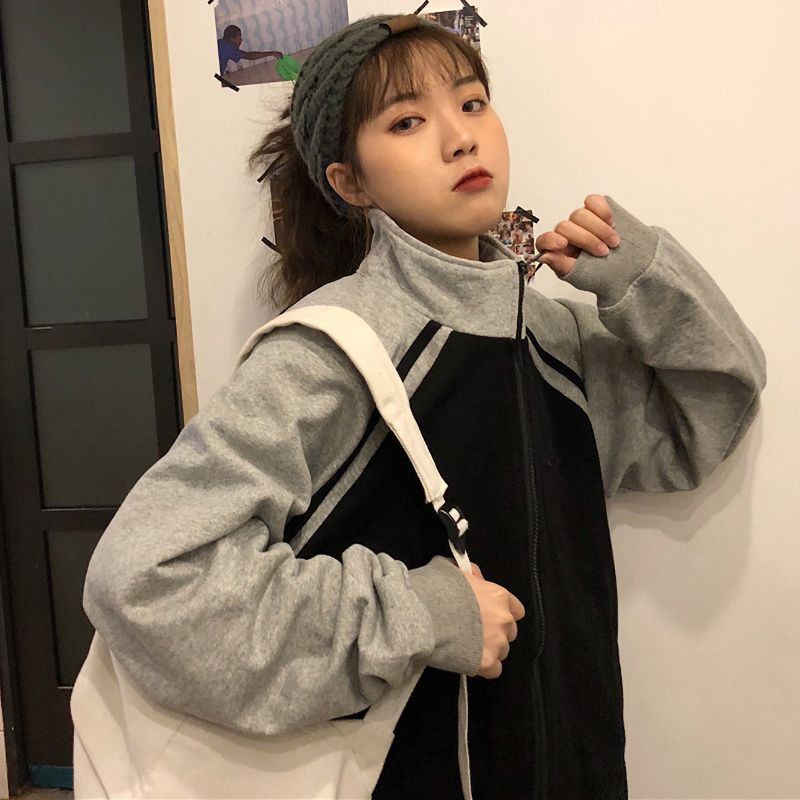 Áo khoác dáng rộng cổ cao phối khoá kéo cho phái nữ