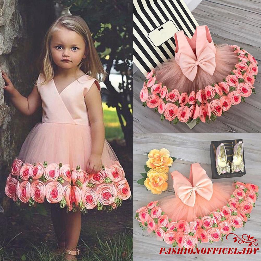 Đầm xòe công chúa viền hoa hồng phối nơ đáng yêu cho bé gái