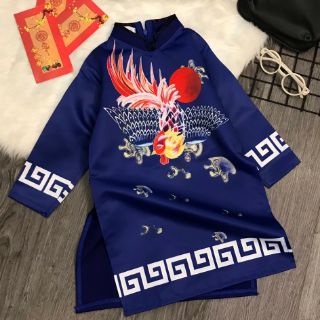 Áo dài bé trai chat lieu vai lua men