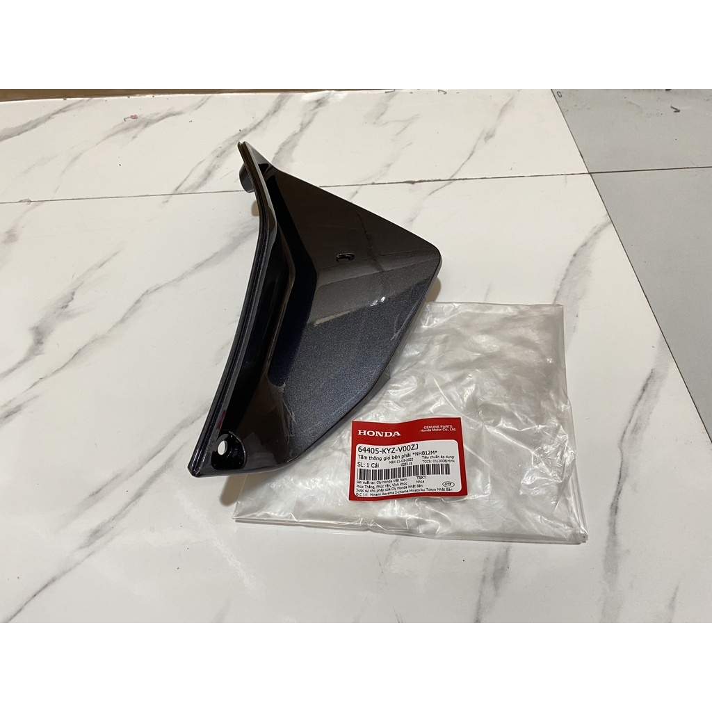 Tấm thông gió bên phải HONDA FUTURE125 năm 2012 màu Xám ghi.