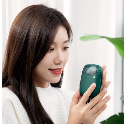 Máy sưởi ấm mini cầm tay đáng yêu Remax NS02 - Sử dụng 6-12h kiêm sạc dự phòng - 5400mAh - chính hãng