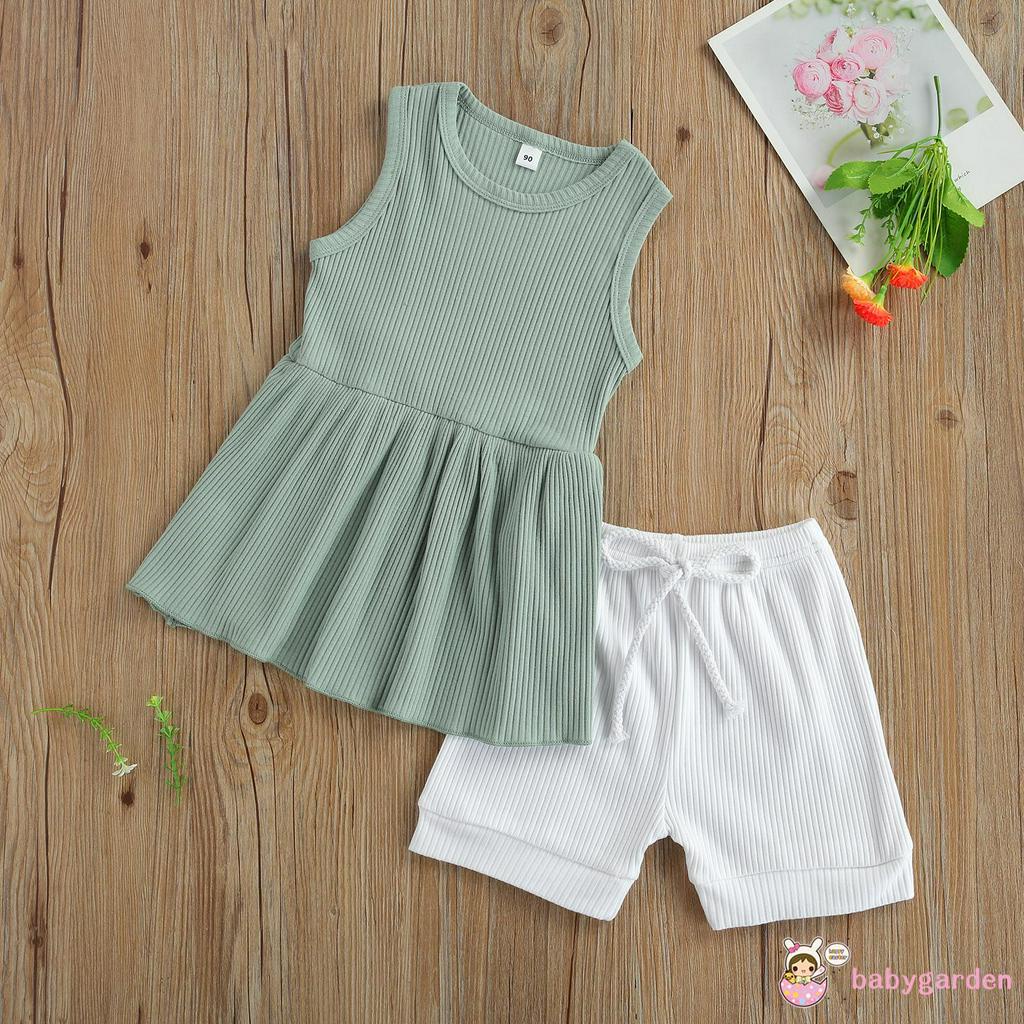 Bộ áo không tay cổ tròn và quần short bằng vải thun gân cho bé gái từ 2-7t