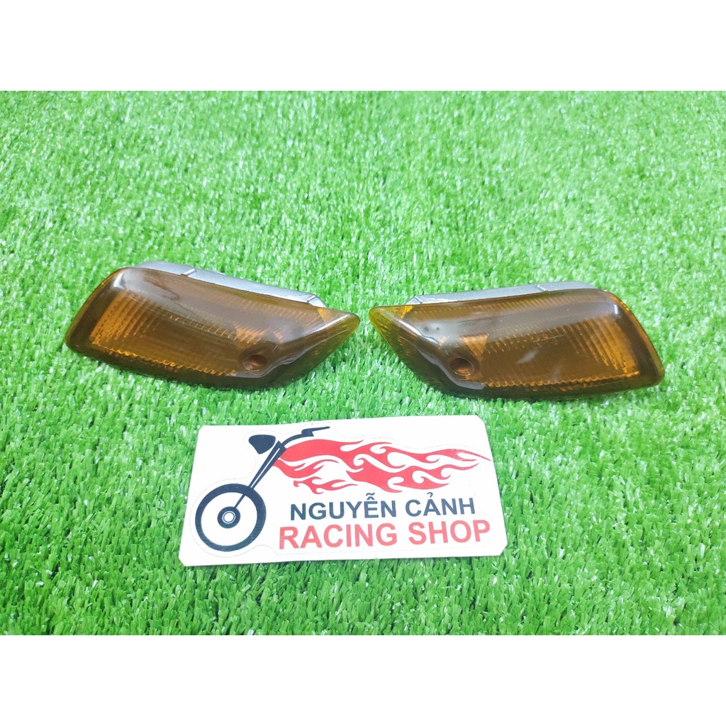 Xi nhan pha đèn hậu satria 2000