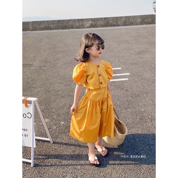 Váy bé gái phong cách Âu màu vàng