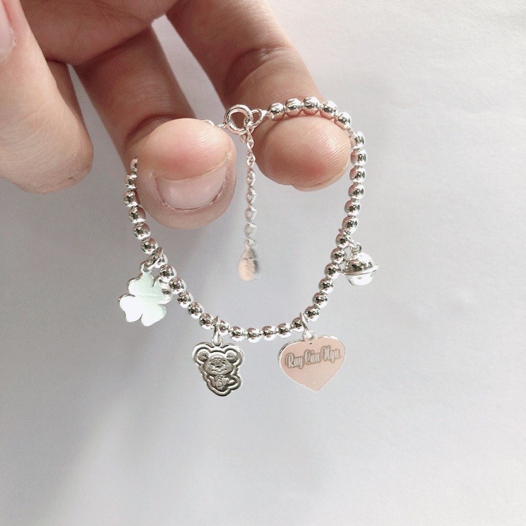 Vòng lắc tay bạc khắc chữ cho trẻ em chất liệu từ bạc cục kéo ra độ tinh khiết của bạc cao nhất