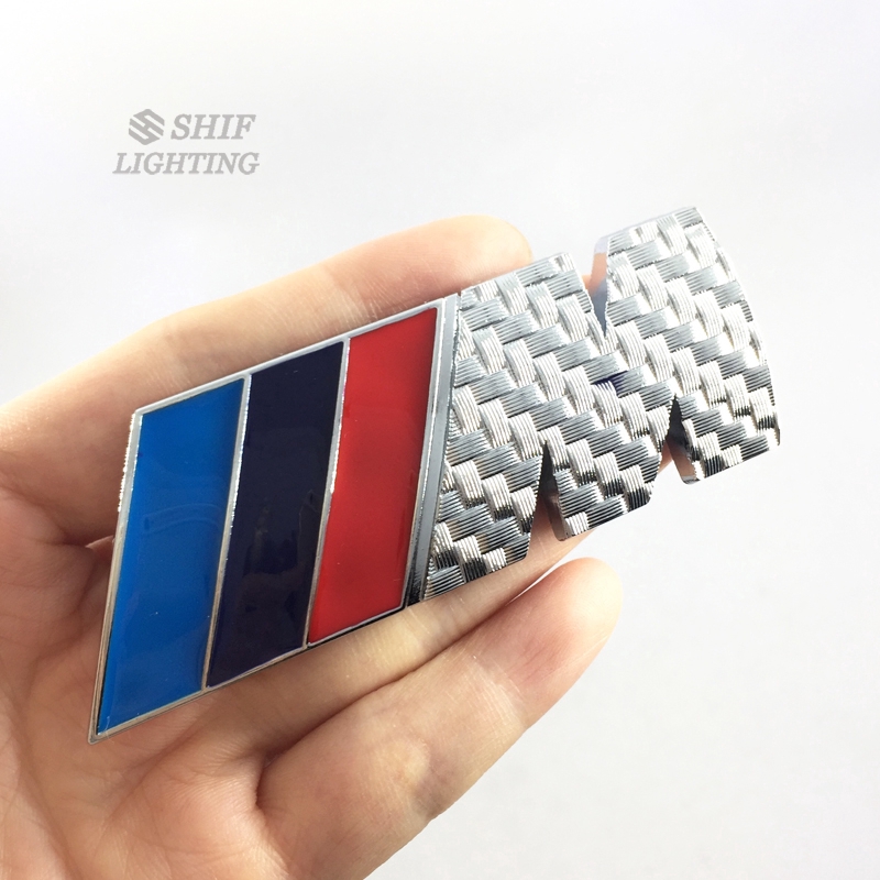 Miếng dán hình logo ///M bằng kim loại mặt sợi carbon dành cho xe hơi BMW