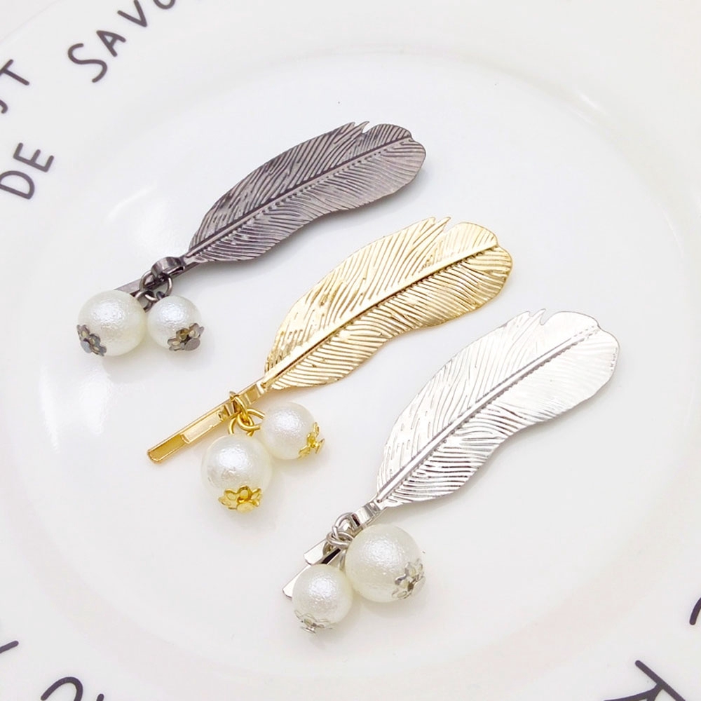 Kẹp tóc kim loại hình lá đính hạt giả ngọc trai