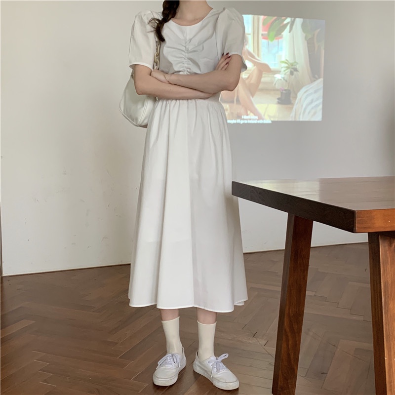 Đầm midi SUXI tay phồng màu trơn ôm dáng phối nơ sau lưng phong cách Hàn Quốc gợi cảm cho nữ