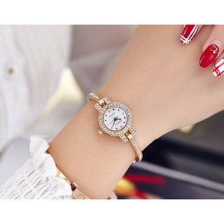 Đồng hồ lắc tay mặt tròn đính đá