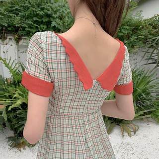 Đầm caro nút bọc