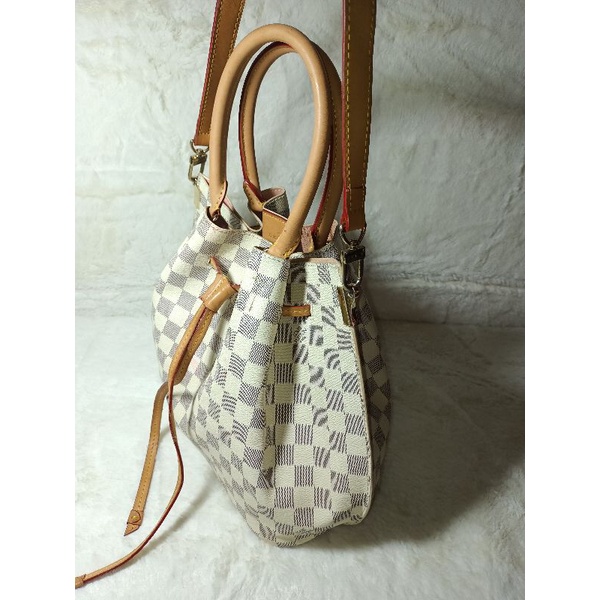 Túi xách si hiệu Lv