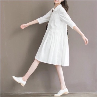 Đầm babydoll trắng nút