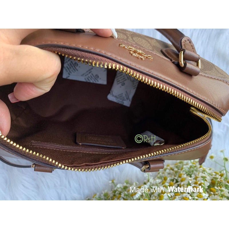 Túi C.oach trống mini logo