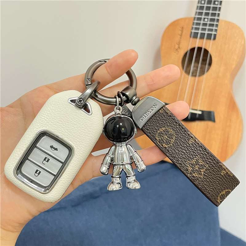 Móc khóa cute KuuClothes ô tô anime màu đen xanh chết liệu cao su nhựa siêu bền - Móc Khoá Phi Hành Gia