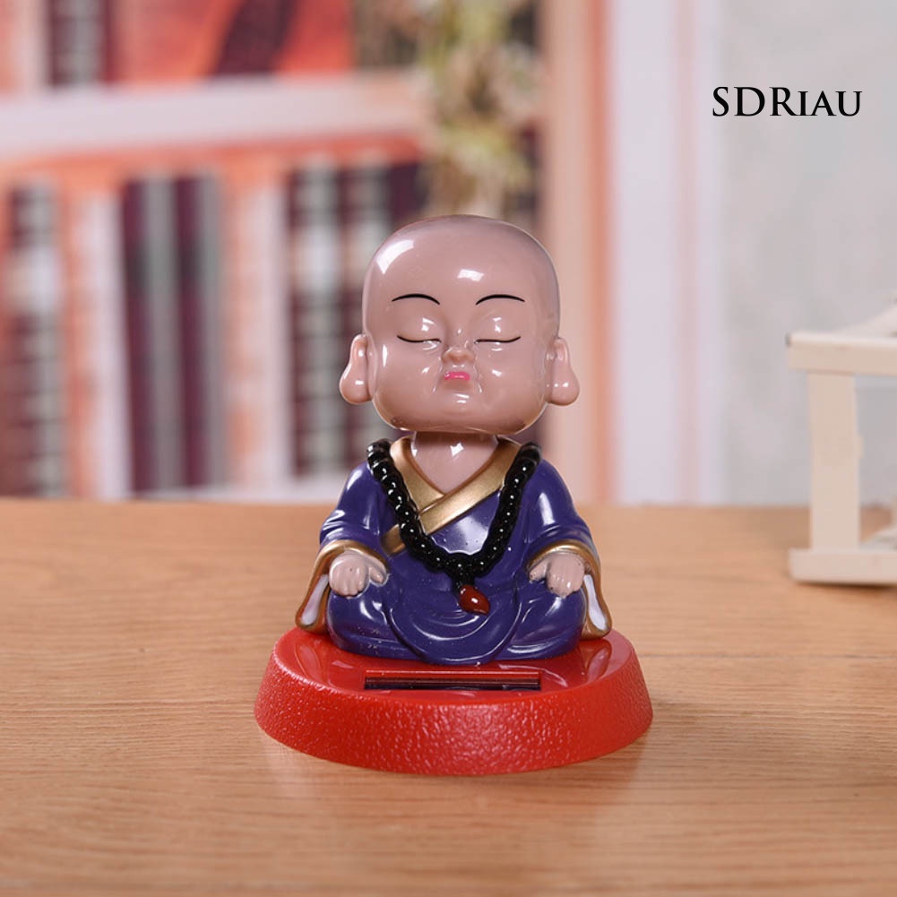 Đồ Chơi Tượng Chú Tiểu Hoạt Hình Sử Dụng Năng Lượng Mặt Trời