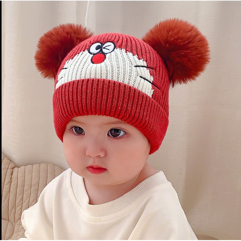 Mũ nón len Mèo Doremon đội mùa đông cho bé trai bé gái dưới 1 tuổi có Hai Quả Bông hình Mèo Doremon 2020