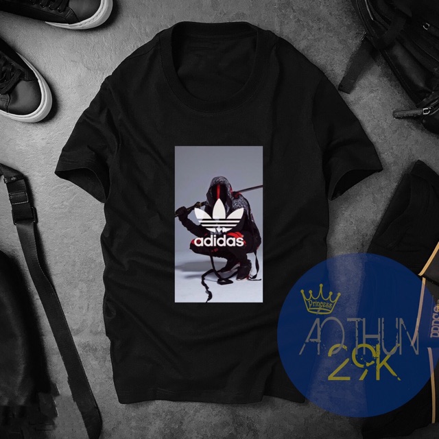 ALBUM 424 - ÁO THUN UNISEX DAS ĐEN CÁ TÍNH