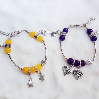 Vòng tay đá màu vàng tím phụ kiện. 30k