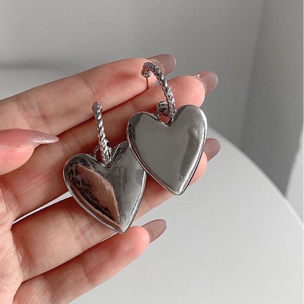 Bông tai dài hình nơ tua rua đơn giản