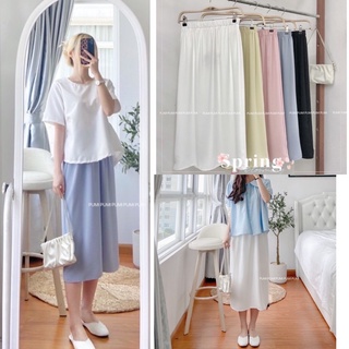 Chân váy dài xẻ sau dễ phối áo tạo nên cá tính Pumi