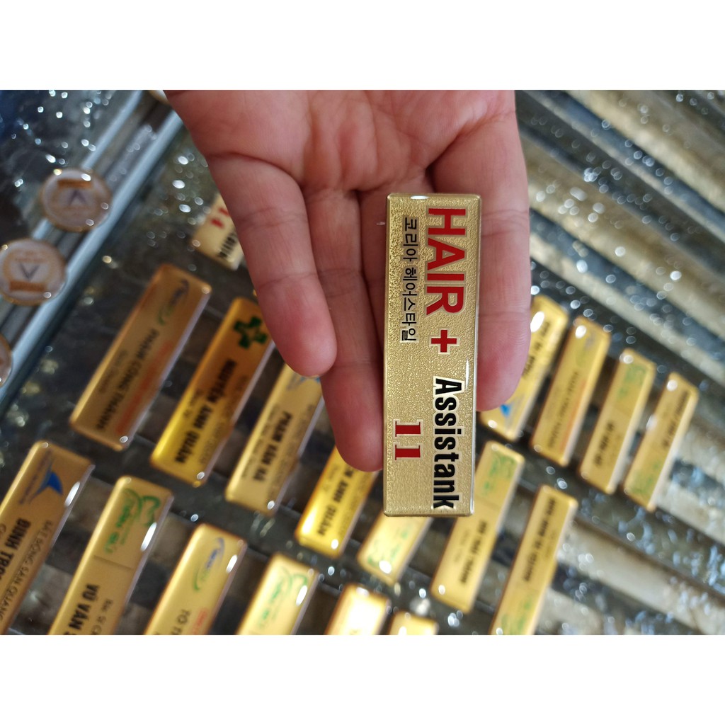 Thẻ tên đồng ăn mòn, thẻ tên cài áo