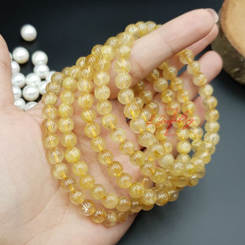 1 hạt đá tóc màu vàng