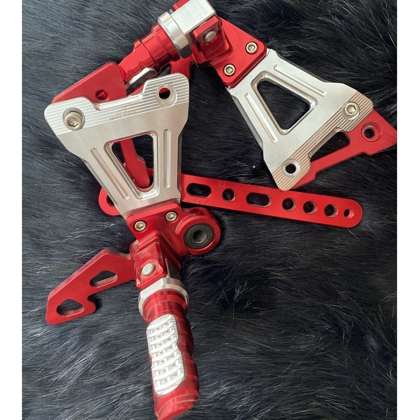 Bộ gác chân sau xe exciter 150 màu vàng đen hàng chính hãng full box