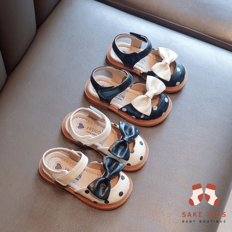 Giày búp bê bé gái, Giày sandal quai dán phối nơ chất da PU êm nhẹ đế cao su mềm chống trơn trượt cho bé 1-5 tuổi M13