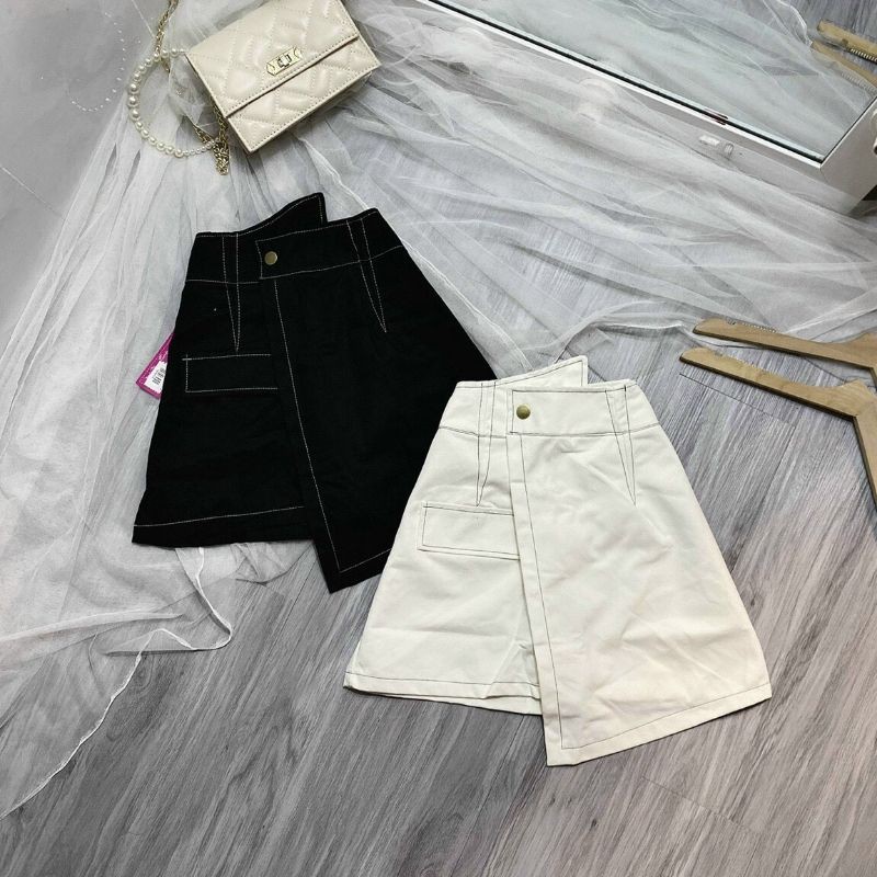 Chân váy viền chỉ lệch tà