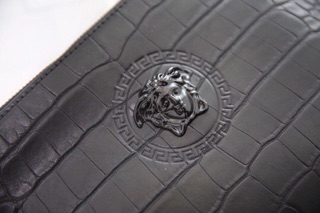 Clutch cầm tay da rắn
