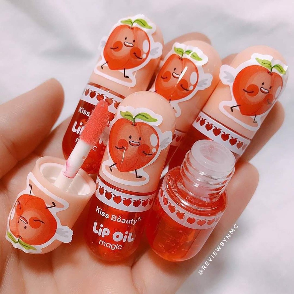 Son tint bóng môi Magic Lip Oil Trái Đào