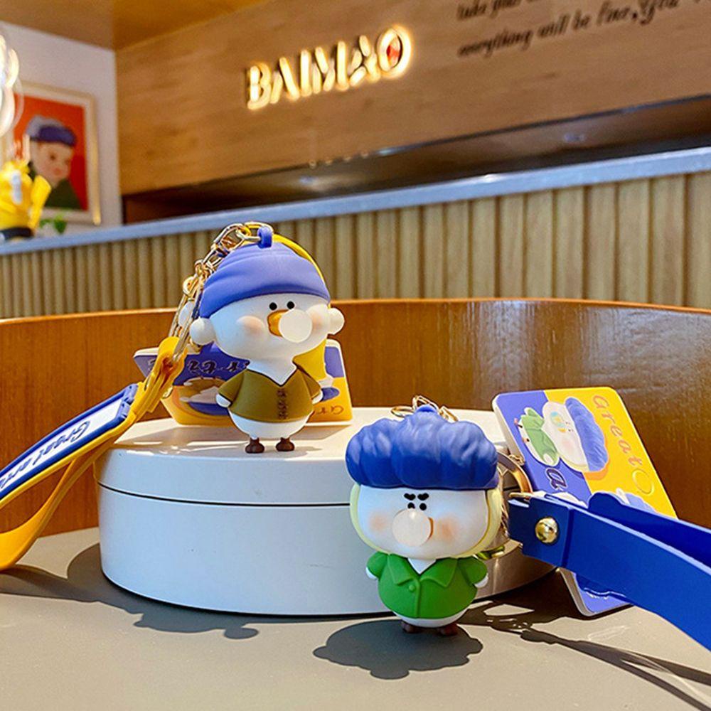 Móc Khóa Hình Vịt Thổi Bong Bóng Bằng Hợp Kim Sáng Tạo Dành Cho Nam Nữ Giá Đỡ