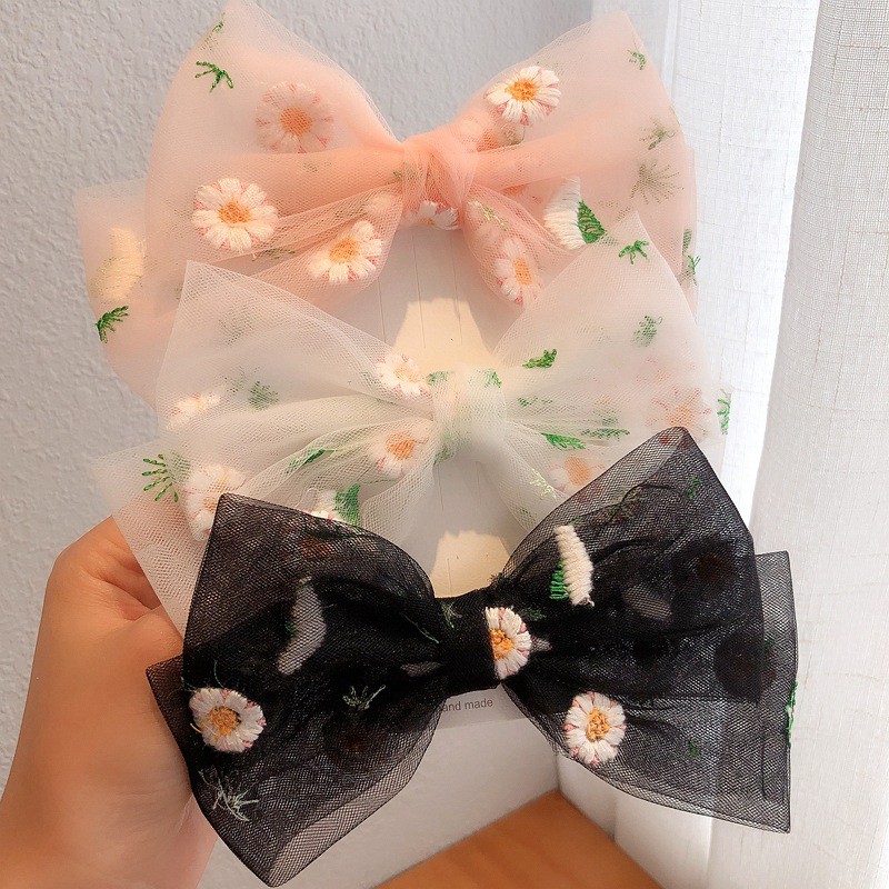 K70 Kẹp nơ hoa cúc lá xanh vải lưới