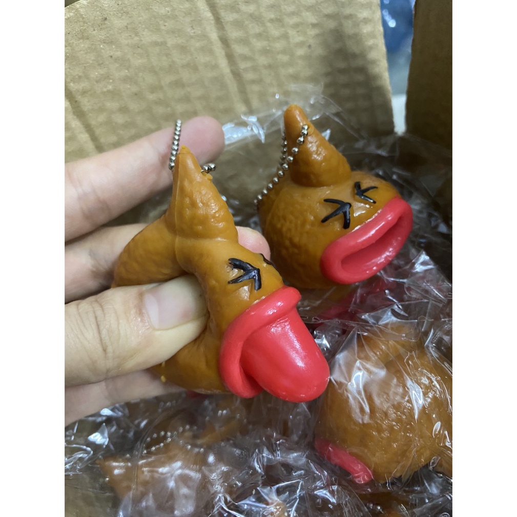 Móc khóa hình cục shit bóp lè lưỡi đồ chơi giải trí vui nhộn squishy cực hay