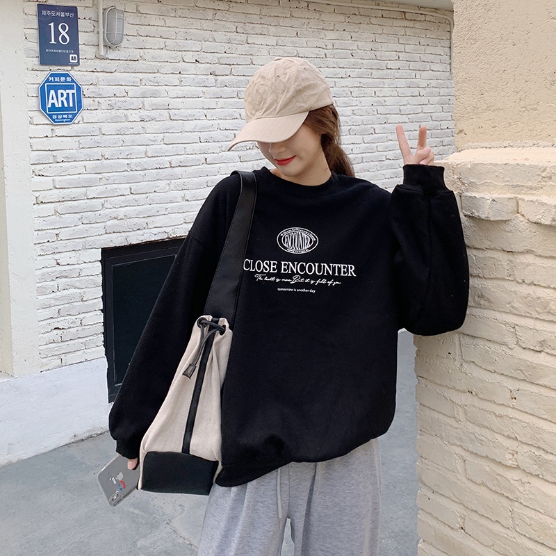 Áo thun tay dài dáng rộng in chữ phong cách Hàn Quốc thời trang cho nữ