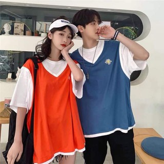 Áo thun phối thêu hoa.