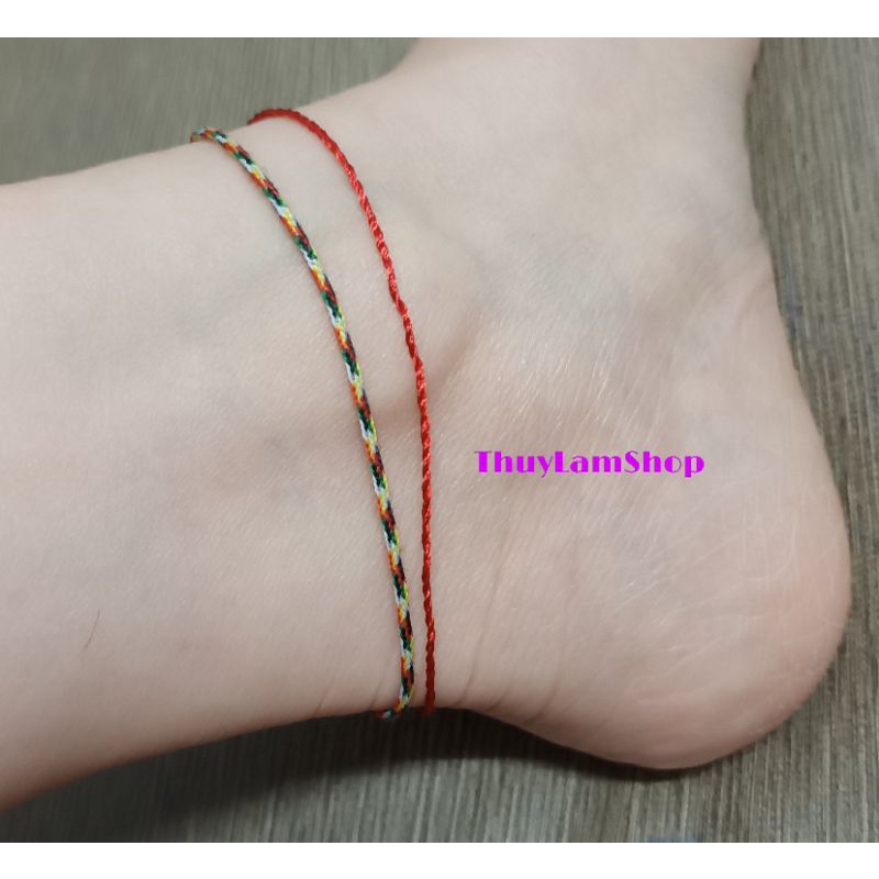 Lắc chân sợi chỉ ngũ sắc và chỉ đỏ Thái đã Trì Chú bình an may mắn