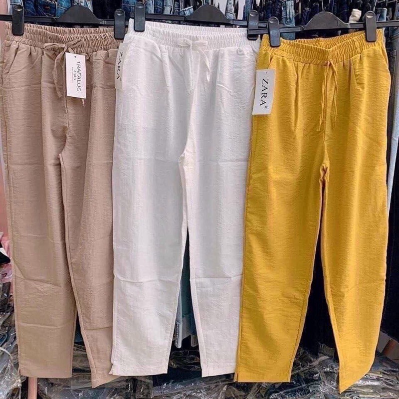 quần đũi xẻ gấu nữ