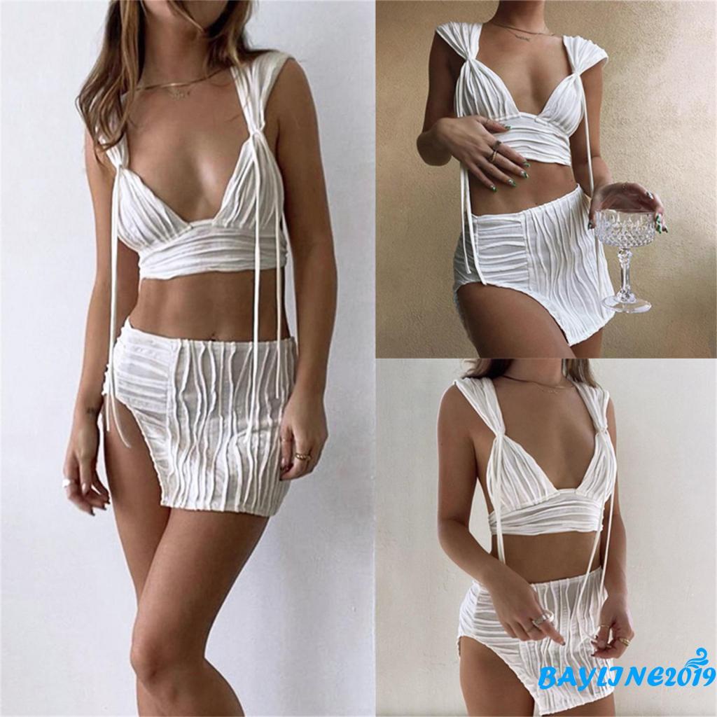 Set Đồ Mùa Hè 2 Món Gồm Áo Không Tay Hở Lưng Màu Trắng + Chân Váy Xếp Ly Lệch Tà Cho Nữ