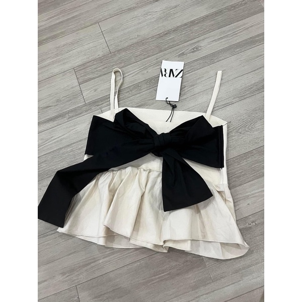SẴN ÁO 2 DÂY KÈM NƠ PHIÁ SAU LƯNG SIÊU XINH( Kèm ảnh shop chụp)