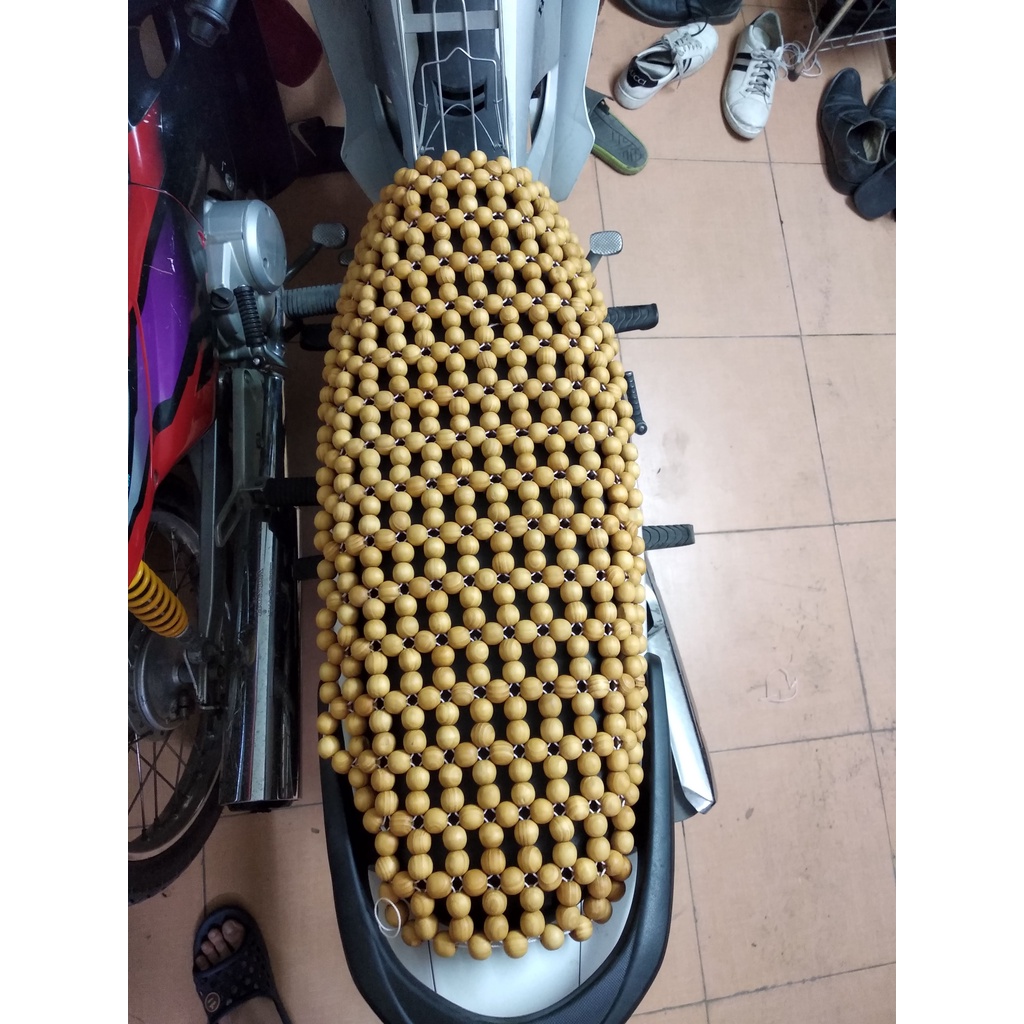 Lót yên xe máy - đệm yên xe máy hạt gỗ