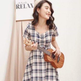 Đầm caro nhún ngực