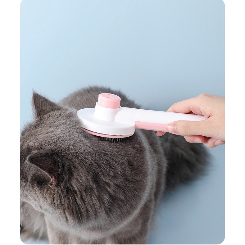 lược tròn chải lông rụng có nút bấm cho thỏ, chó, mèo