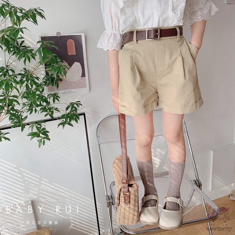 Bộ đồ gồm áo ren tay ngắn kèm quần đùi và thắt lưng phong cách Hàn Quốc cổ điển dành cho bé gái