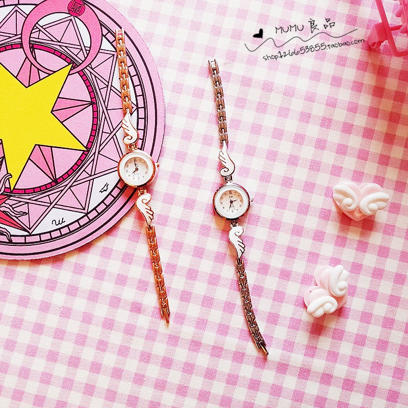 (Đọc kĩ mô tả) Đồng hồ đeo tay nữ đôi cánh Sakura Thủ Lĩnh Thẻ Bài hãng Jue