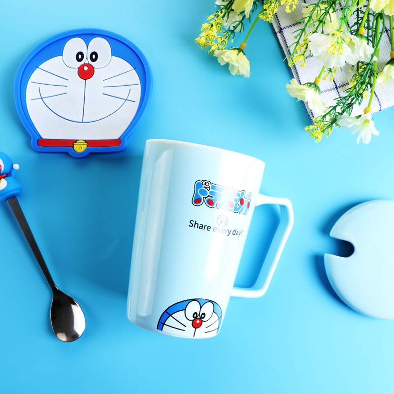 Cốc sứ kèm muỗng hình mèo Hello Kitty / Doremon dễ thương thích hợp làm quà tặng