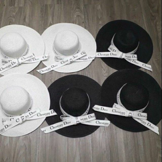 Mũ cói đi biển vành rộng dây nơ Dio trắng siêu sang